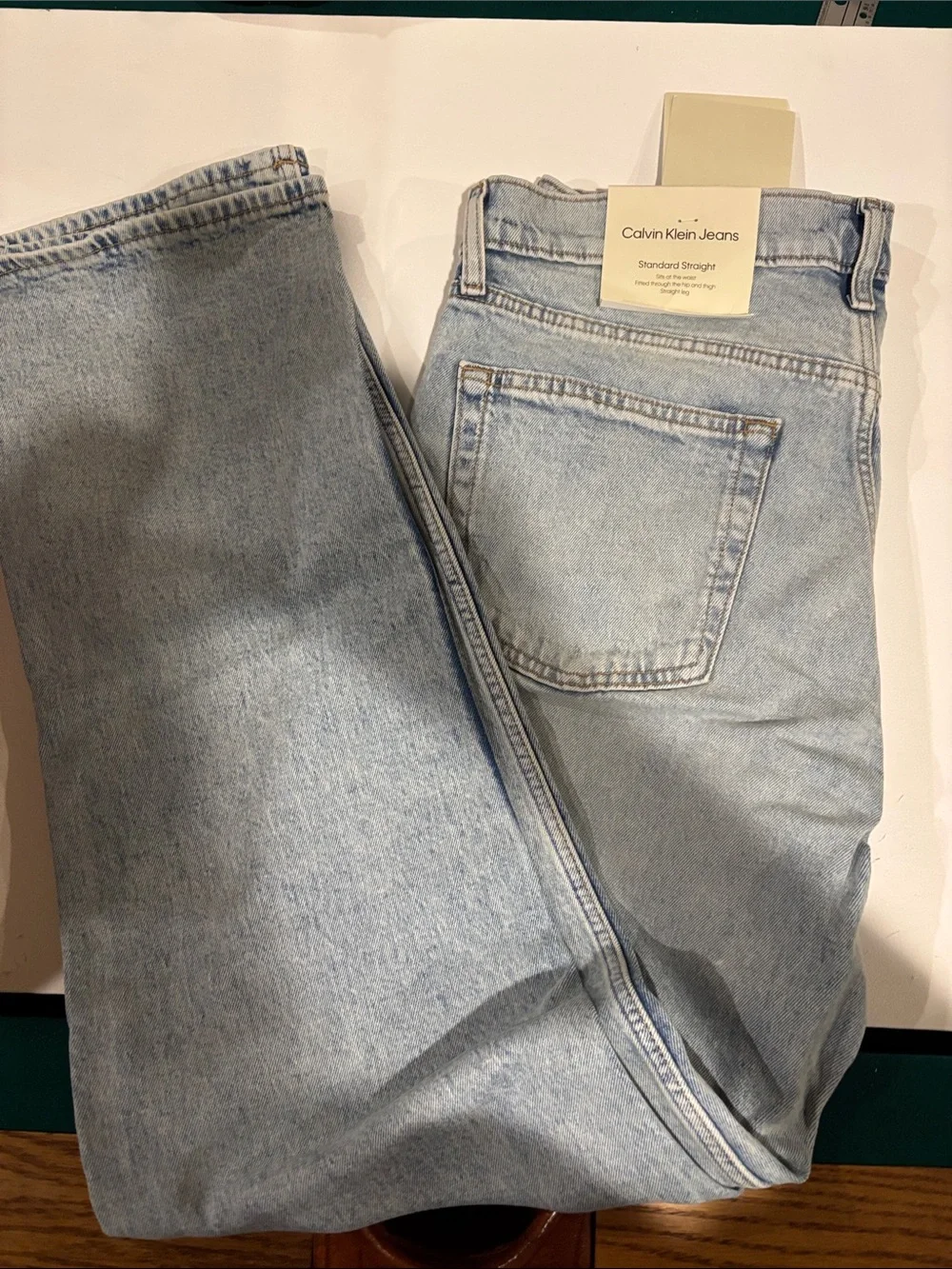 Calvin Klein Light Wash Denim Jeans with Tan Leather Patch - Picture 4 of 10